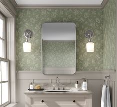 a bathroom with a sink, mirror and towel rack