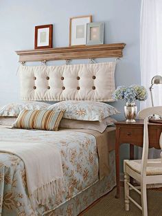 a bedroom with blue walls and white furniture