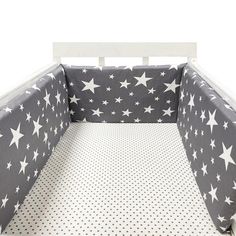 a baby crib bed with stars on it