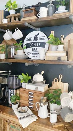 the shelves are filled with pots, plates and other kitchen utensils on display