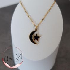 This elegant crescent moon and star necklace features sleek black detailing, perfect for those who love minimalist celestial jewelry. A unique and stylish accessory, it makes an ideal gift for any special occasion. Made of stainless steel The pendant is approx 5/8" long. The chain is 19" long, including the extender. Orders are shipped within 1-2 business days. General jewelry care - keep the item dry and away from moisture. All photos are owned by Char + Cait Boutique and are prohibited from being used without permission. Moon And Star Necklace, Crescent Moon And Star, Celestial Jewelry, Moon And Star, Star Necklace, Crescent Moon, Stylish Accessories, Jewelry Care, Crescent