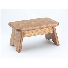 small wooden step stool on white background