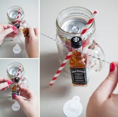 a person is holding a jar with some liquid in it and two straws are on the table