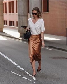 What To Wear With Satin Skirt [2023]: 70+ Stylish Satin Skirt Outfits To Stay On-Trend - Girl Shares Tips Satin Skirt Summer, Skirt Outfit Casual, Trends In 2023, Satin Pleated Skirt, Anouk Yve