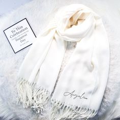 Personalized Shawl Pashmina with Signature embroidery , you can customize name or wording. 🎉This product is for Wedding favors for guests, wedding gifts, and special gifts for a special person. You can also add your personalized texts or name, font styles, and colors. Our shop specializes in embroidery therefore, customers can be confident that the products will be beautiful🎉 ѧѦ ѧHOW TO ORDER: 1)  Pick the color of the products. 2)  Pick the Fonts color. Also, If you would like to see the mockup, please contact me message box :)      🎁Specifications of the product: -It can be washed (Non-Discoloration) -Soft fabric. -Dimension: 78.74X27.55 inch. -Weights: 230 grams 📌If you have any questions, please contact me by message box :) We're looking forward to delivering these very special ite Wedding Favors For Guests, Message Box, Font Styles, Our Wedding Day, Special Person, Wedding Favours, Gift Registry, Wedding Favors, Special Gifts