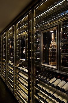 a wine cellar filled with lots of bottles