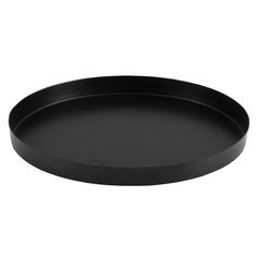 an empty black plate on a white background