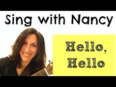 a woman holding a guitar with the words hello, hello written in front of her