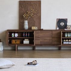 a living room scene with focus on the sideboard