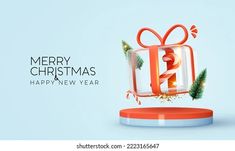 an image of a christmas present on a blue background with the words merry christmas and happy new year