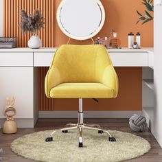 a yellow office chair sitting in front of a desk with a mirror on top of it