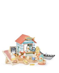 a toy beach hut with chairs and umbrellas