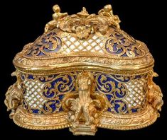 an ornately decorated blue and gold box