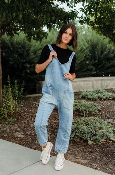 One-and-done and so simple, this denim jumpsuit from the We The Free Collection is featured in a relaxed fit and cropped ankle-length style with harem legs and a low scoop neckline. * Slouchy, relaxed fit* Material Content: 100% Cotton Material Pattern: denim Jyrikka is 5’3” and wearing a small Model Measurements: Jyrikka: Height: 5’3” // Chest: 32” // Waist: 27” // Hips: 33 Kenzi is 5'10" and wearing a small Model Measurements: Kenzi: Height: 5'10" // Chest:32.5 ” // Waist:26 " // Hips: 36" Cli Free People Denim Jumpsuit, Free People Overalls, Free People Jumpsuit, High Roller, Free People Style, Jumpsuit Outfit, Bib Overalls, Free People Denim, Fall Style