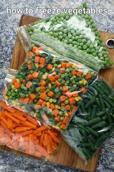 three bags of vegetables on a cutting board with the words how to freeze veggies