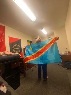 a person holding a flag in an office