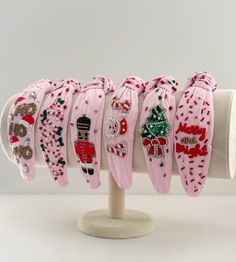 Celebrate the festive spirit in style with our enchanting Christmas headbands, hand-beaded to shimmer and shine throughout the holiday season. Each headband boasts joyful colors and intricate beadwork that captures the essence of Christmas cheer. WIDTH: 6.5" HEIGHT: 2.5"  Fits Most Children and Adults. We recommend these for Children 5+ Multiple Designs Available Pj Ideas, Joyful Colors, Christmas Headbands, Hair Bands For Women, Wishlist Ideas, Holiday Headbands, Christmas Hair Accessories, Pastel Christmas, Holiday Music