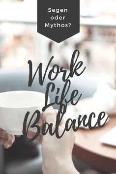 a person holding a coffee cup with the words work life balance in front of them