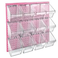 a pink and white display case filled with lots of clear bins on top of each other