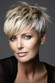 Tousled pixie with edgy bangs is a sophisticated and youthful hairstyle. This is a perfect choice for ladies who enjoy a bob with some variation. Click here to check out more flattering hairstyles for women over 60 with bangs. Kort Bob, Short Spiked Hair, Hairstyles For Women Over 60, Short Hair Pixie Cuts, Spiked Hair, Short Grey Hair, Super Short Hair, Messy Short Hair, Choppy Hair