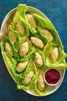 lettuce wraps with chicken and cranberry sauce on a white platter