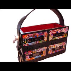 a handbag with an old school design on it