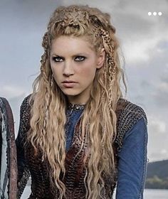 Lagertha is a beautiful honey blonde lace front synthetic wig with multiple braids and silver toned accent beads. Perfect for cosplay, renfests and Larp. Its comfortable and super realistic making your dream hair come true. Each wig is unique and may vary from photos. Easy Viking Makeup, Norwegian Hairstyles, Lagertha Costume, Targaryen Hair, Viking Makeup, Honey Blonde, Costume Hats, Dream Hair, Synthetic Wigs