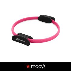 a pink bracelet with two black magnets on it