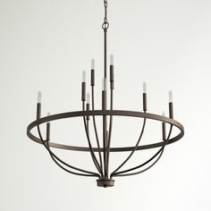 a large chandelier with six lights hanging from it's center point,