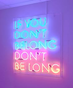 a neon sign that says if you don't belong belonging don't be long