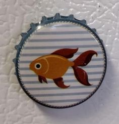 Perfect for refrigerators, lockers, file cabinets, magnetic boards, etc. Orange Fish Bottle Cap Magnet Magnets are made to order, will ship within a few days of ordering so as to allow for time to make them and get them sent. Fish Bottle, Bottle Cap Magnets, Magnetic Boards, Orange Fish, File Cabinets, Magnetic Board, Saint Paul, Refrigerator Magnets, Bottle Cap