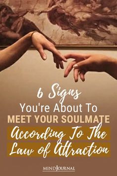 two hands touching each other with the words 6 signs you're about to meet your soulmate according to the law of attraction