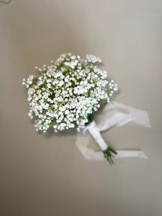 a bouquet of white baby's breath flowers