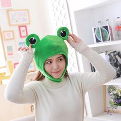 Store Home 丨Health & Beauty 丨Clothing, Shoes & Accessories 丨Crafts 丨Jewelry & Watches 丨Home & Garden 丨Pet Supplies 丨Sporting Goods Stuffed Animal Frog Costume Hat Novelty Soft Stuffed    Description: Creative Design --- The headgear features cartoon animal , which looks individual and eye-catching. Size --- 31x25cm/12.2x9.8inch, size fits most adults and children. Great Gifts --- Super gifts for your friends and children, make them happy. Great accessory for any adult's or child's costume Premium Material --- Made of environmental PP cotton filler, soft , wear resistance and . Occasions --- Not only for christmas hat, winter hat, hat, kids hat, toy headwear, party prop , it is able to keep warm too. Suitable for wearing it to take photos, also a great gifts for your friends and kids! Packa Frog Dress, Frog Costume, Frog Hat, Hood Hat, Cute Funny Cartoons, Kids Hat, Frog Design, Halloween Hats, Super Gifts