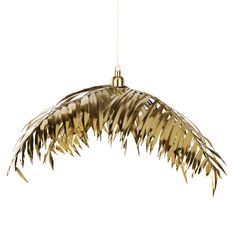 a light that is hanging from the ceiling with some feathers on it's side