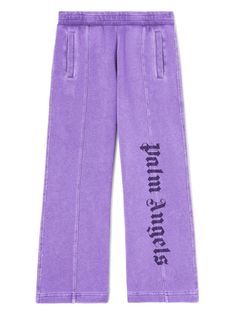 violet purple cotton logo print at the leg elasticated waistband two side welt pockets wide leg Cotton Bottoms With Logo For Loungewear, Logo Cotton Pants For Streetwear, Casual Logo Pants For Streetwear, Athleisure Cotton Bottoms With Logo Print, Cotton Athleisure Bottoms With Logo Print, Sporty Relaxed Fit Pants With Logo Print, Purple Sweatpants For Spring Streetwear, Trendy Cotton Bottoms With Logo Print, Sporty Cotton Sweatpants With Logo