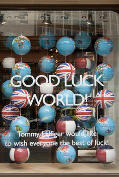 an image of a window display with balloons in the shape of british and uk flags