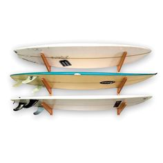 two surfboards are hanging on the wall