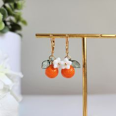 Orange earrings Handmade Apricot Earrings For Gift, Handmade Apricot Earrings Perfect For Gifts, Orange Drop Earrings For Gift, Cute Nickel-free Orange Jewelry, Handmade Orange Dangle Flower Earrings, Orange Earring Jewelry Gift, Orange Dangle Flower Earrings With Ear Wire, Orange Adjustable Dangle Flower Earrings, Orange Dangle Flower Earrings For Gift