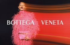 a woman in a pink dress with feathers on her body and the words botteca veneta