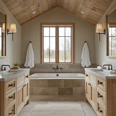 a large bathroom with two sinks and a bathtub