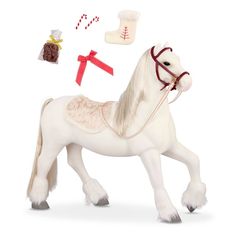 a white toy horse with red ribbon and christmas decorations around it's neck, on a white background