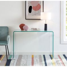 a glass table with a shell on top