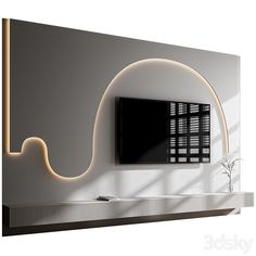 the television is mounted on the wall in front of the window and has an interesting curved design