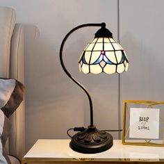 a lamp that is on top of a table