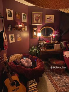 a living room filled with lots of furniture and pictures on the wall next to a guitar