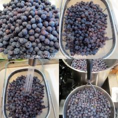 blueberries are being washed and put in strainers