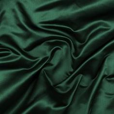 the green fabric is very soft and shiny