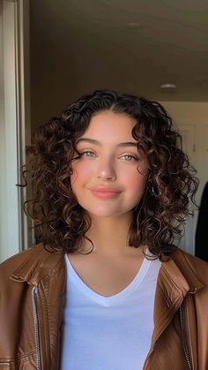 Perfectly Stylish: 24 Medium-Length Cuts for Women with Round Faces in 2024 Hairstyles For Round Face Curly Hair, Curly Haircut Middle Part, Short Curly Hair With Round Face, Layered Curly Hair Round Face, Hairstyles For Round Faces Curly Hair, Round Short Curly Hair, Shoulder Length Wavy Curly Hair, Curly Haircuts Short Layers, Curly Haircuts For Round Face