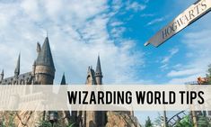 the wizarding world tips sign in front of hogwarts castle